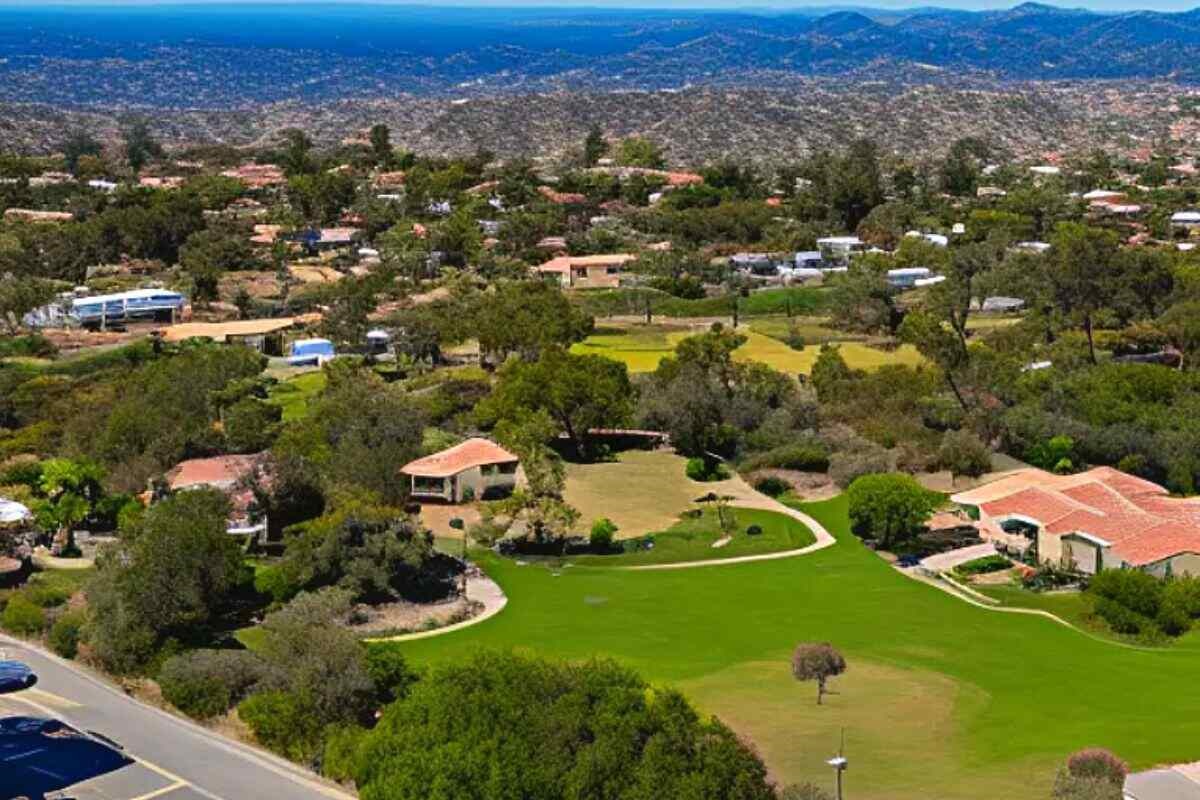 aerial view of Escondido CA showing green-space and trees around well maintained landscaped gardens